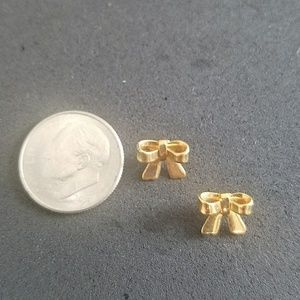 Gold bow stud earrings